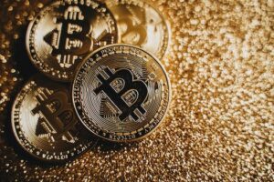 Bitcoin Jumps to $47K, Ethereum and Crypto-Related Stocks Surge after Spot BTC ETF Approval in US. In a historical twist, the US Securities and Exchange Commission (SEC) approved the listing and trading of 11 spot Bitcoin (BTC) ETFs on Wednesday, January 10. The approval of the spot Bitcoin ETFs narrowly avoided rejection with the support from SEC Gary Gensler. Moreover, the other two Democratic-affiliated commissioners – Caroline Crenshaw and Jaime Lizárraga – voted against the approval of spot Bitcoin ETFs. Consequently, the Bitcoin price briefly rallied above $47.7k in the past 24 hours but has since retracted to trade around $45.7k during the early Asian session on Thursday. Nonetheless, Bitcoin's bullish sentiment has significantly increased, putting in mind the fourth halving event about 100 days from happening. Moreover, there are more deep-pocketed investors seeking to purchase Bitcoins led by El Salvador, BlackRock Inc (NYSE: BLK), and Grayscale Investments, among many others. Notably, fund managers have already begun fighting for clients through spot Bitcoin ETF sponsor fee wars. "Looking forward, it would make sense to see BTC eventually resume rallying higher as supply becomes more scarce while these 11 ETFs begin to gobble up significant amounts of supply," Bartosz Lipiński, CEO of crypto trading platform Cube.Exchange, noted. Ethereum Surges on Spot Bitcoin ETF Approval. Following the approval of spot Bitcoin ETFs in the United States, more investors are now focused on Ethereum (ETH). According to on-chain data, crypto whales have been doubling down their investments in Ether in the past few days. Consequently, Ethereum's price has gained more than 16 percent in the past five days to trade around $2,600 on Thursday, during the early Asian session. Notably, Ethereum's daily average trading volume has spiked more than 80 percent in the past 24 hours to about $45 billion. "With bitcoin potentially becoming harder to buy, it would also make sense that other coins begin to fill the void left behind," Lipiński added. The notable Ether price surge is largely fueled by the fact that several fund managers led by BlackRock have already filed for spot ETH ETF with the US SEC. With the US SEC having already approved the Ether futures ETP, the agency will likely approve spot ETH ETF soon. Crypto-related Stocks Rally in Tandem. The approval of spot Bitcoin ETF in the United States has given confidence in crypto-related stocks. For instance, Coinbase Global Inc (NASDAQ: COIN) stocks gained nearly 5 percent in Wednesday's after-hours trading session to trade around $158.75. Similarly, stocks related to Bitcoin mining companies rallied led by Marathon Digital Holdings Inc (NASDAQ: MARA). Meanwhile, the Grayscale Bitcoin Trust (OTC: GBTC) gained about 4 percent in the past 24 hours to trade around $40.50 on Thursday.